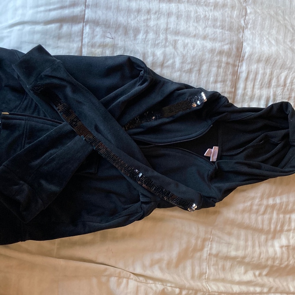 Black stylish spring jacket, sequins on the arms, size six.